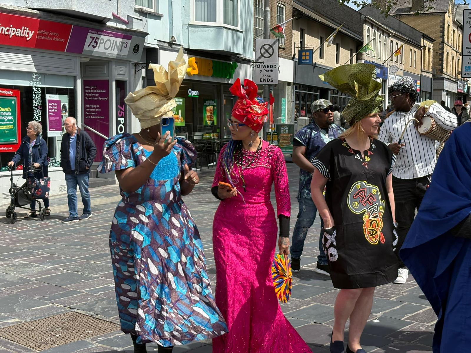 Participants and musicians walking in the procession