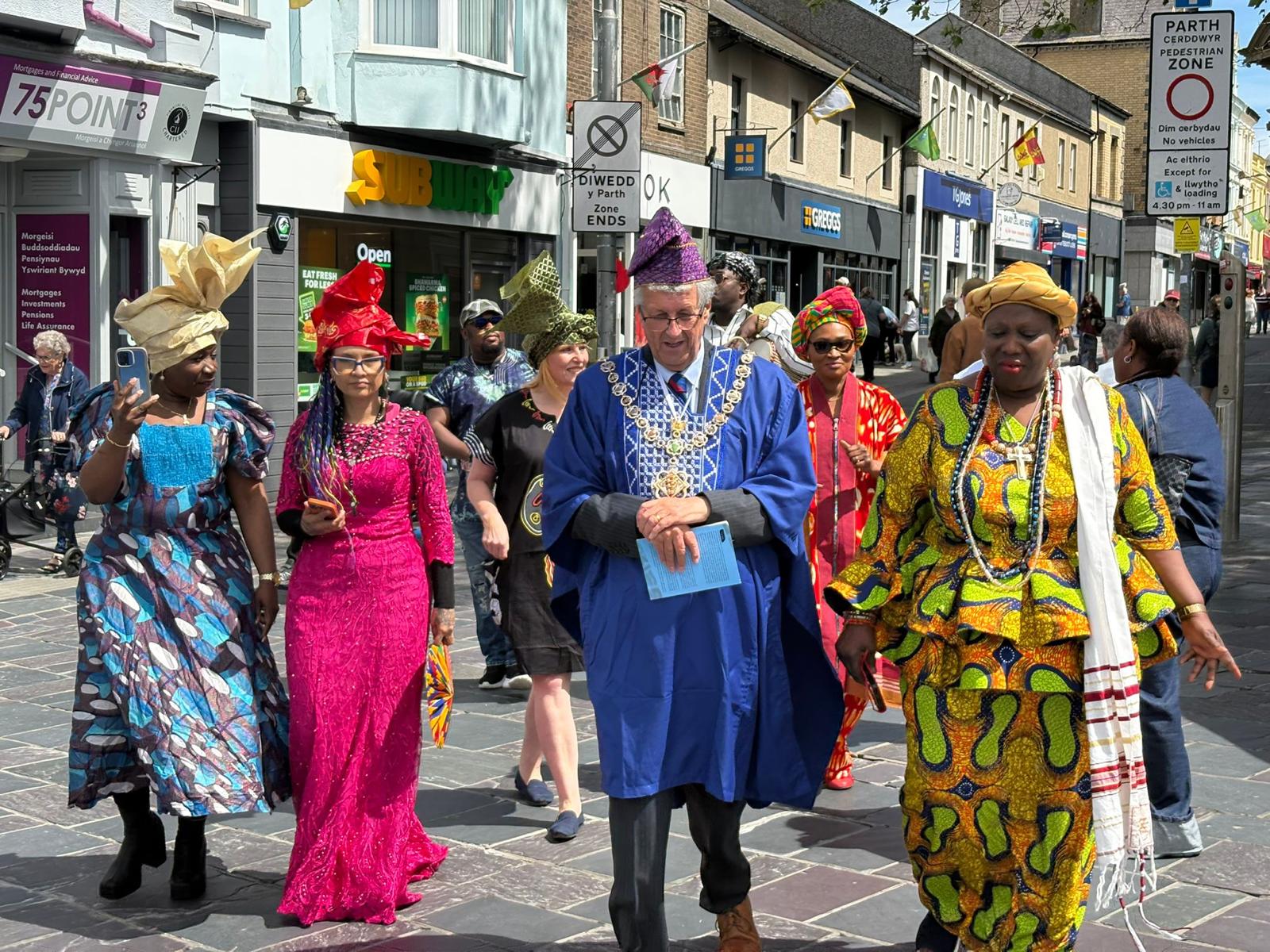 Community group walking together during the celebration